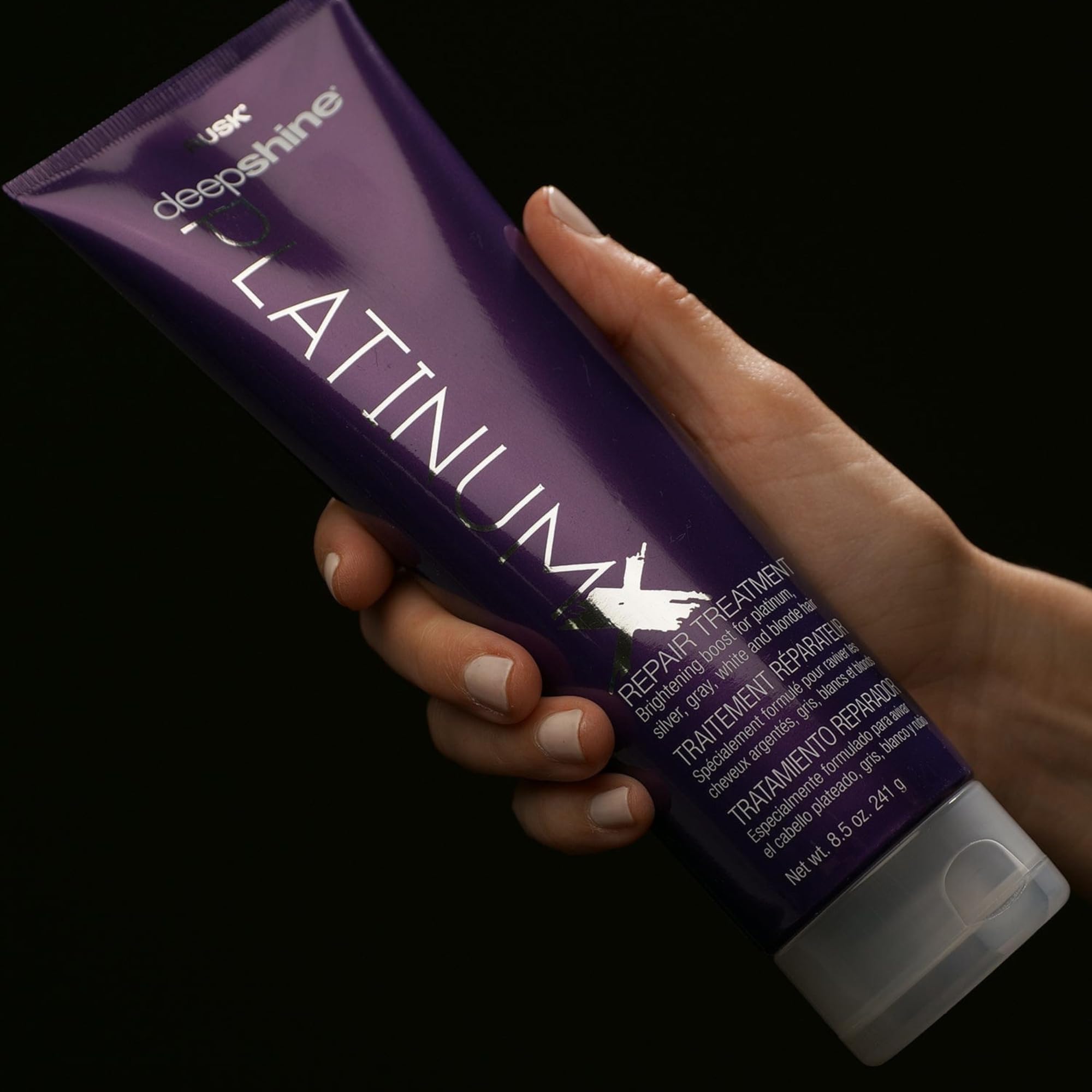 RUSK Deepshine PlatinumX Repair Treatment applied to damaged hair for shine and brightness