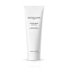 SACHAJUAN Styling Cream bottle closeup for versatile straight or curly styling.
