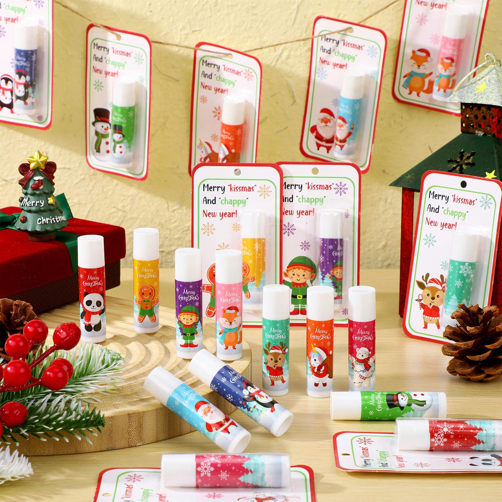 Sacubee lip balm beside wrapped gifts for office party favors.