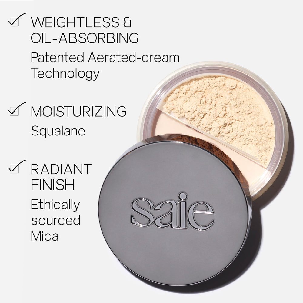 Saie Airset brush application sweeping powder on skin, shows smooth pore-blurring benefit