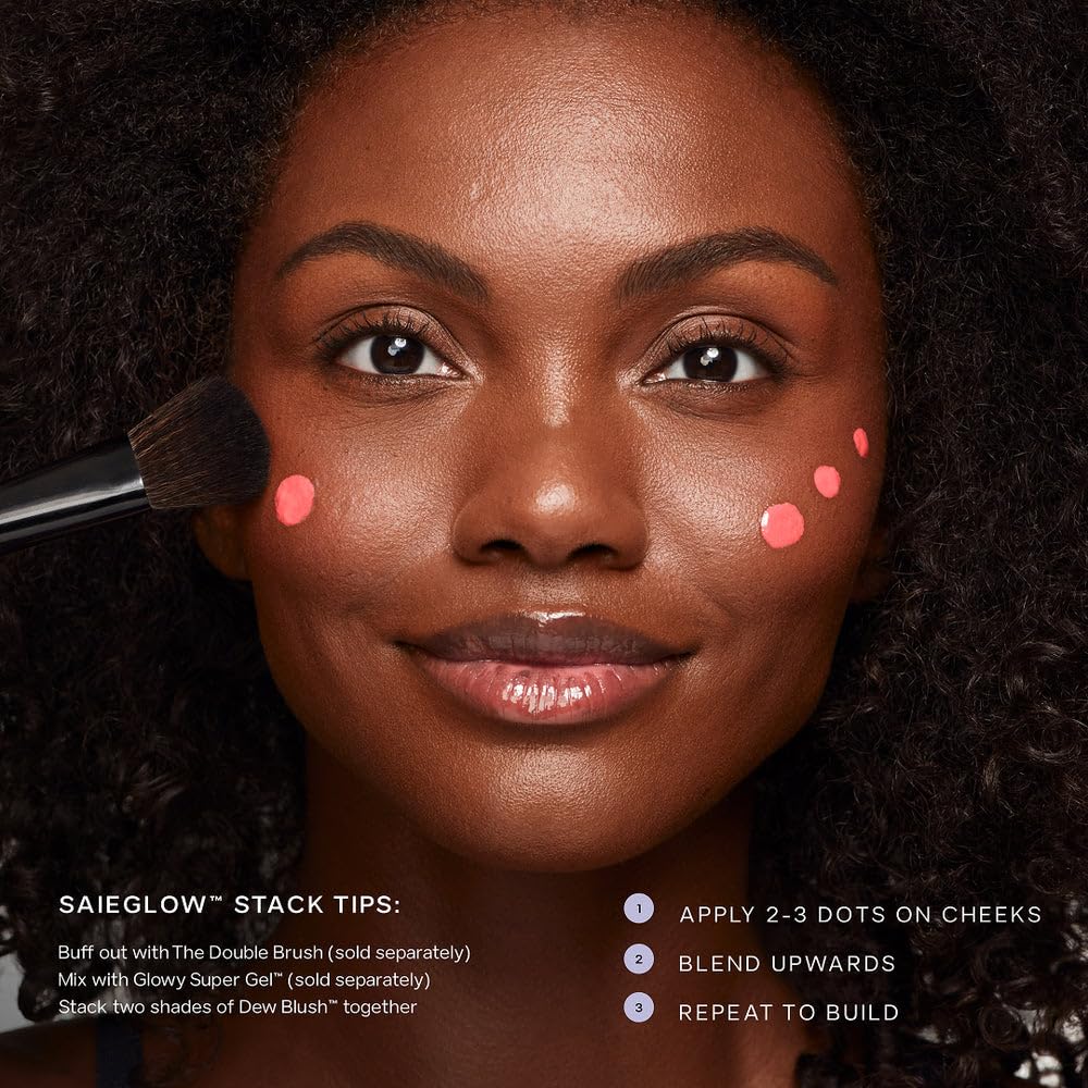 Saie Dew Liquid Blush being blended with finger showing quick seamless coverage benefit