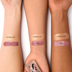 Saie Dew Blush in Lady with doe-foot applicator showing precise placement benefit