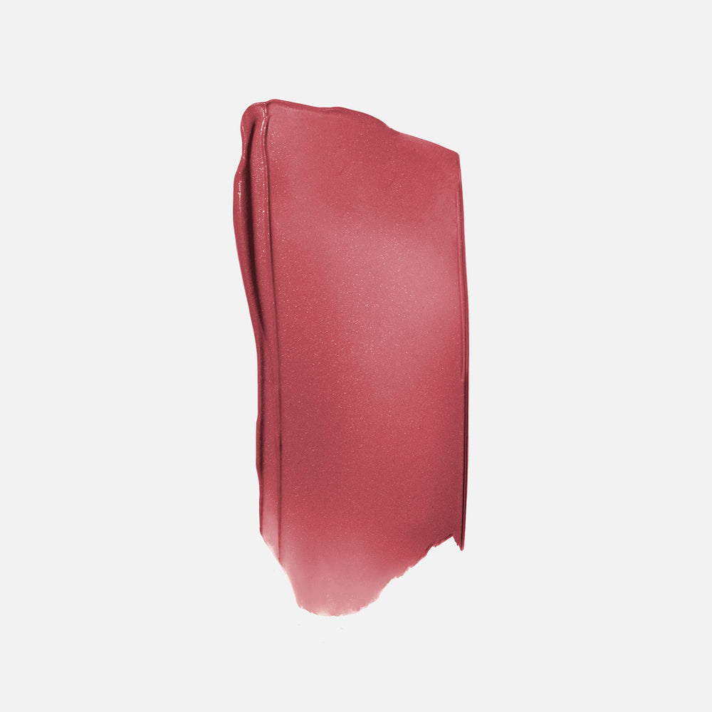 Saie Dew Liquid Blush applicator applying precise dot of color on skin.