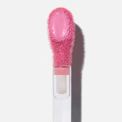 Saie Dew Liquid Blush blended with fingertips for seamless, dewy color.