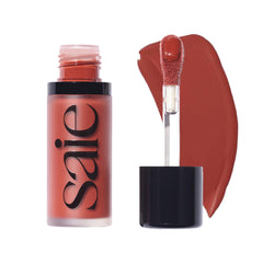 Saie Dew Liquid Blush bottle close-up showing creamy glow for natural flush.