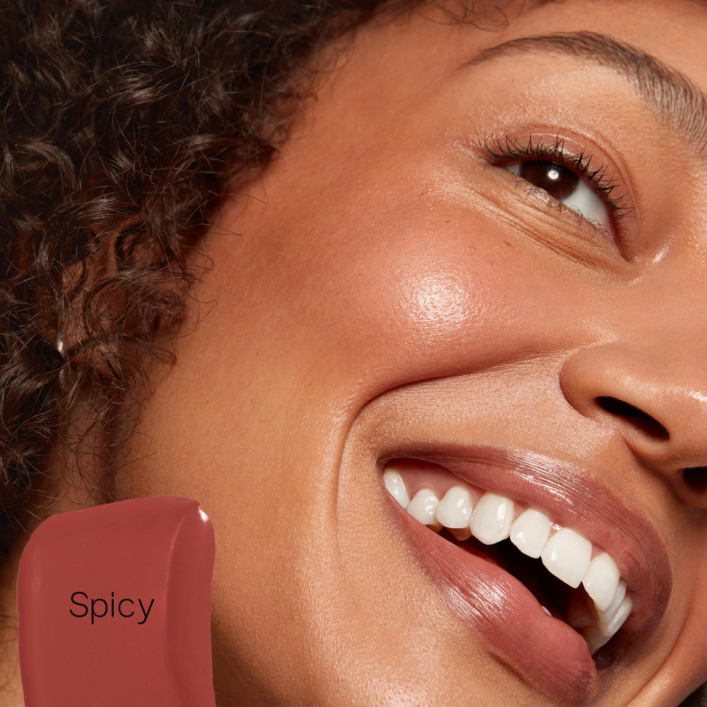 Saie Dew Liquid Blush application with finger or brush for easy blending.