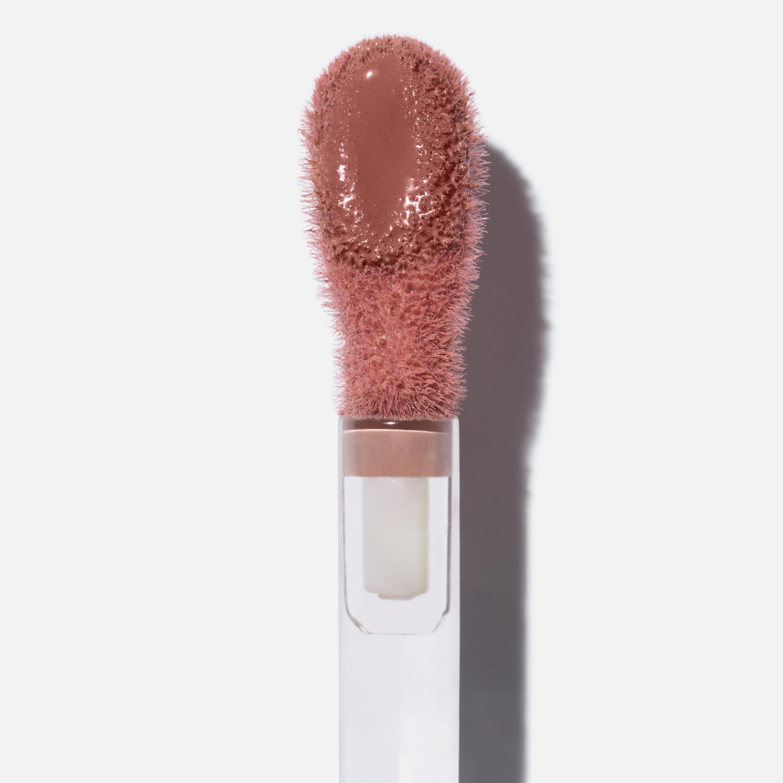 Saie Dew Liquid Blush creamy texture shown for seamless, glow-enhanced cheeks.