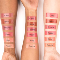 Saie Dew Liquid Blush creamy texture close-up highlighting hydration.