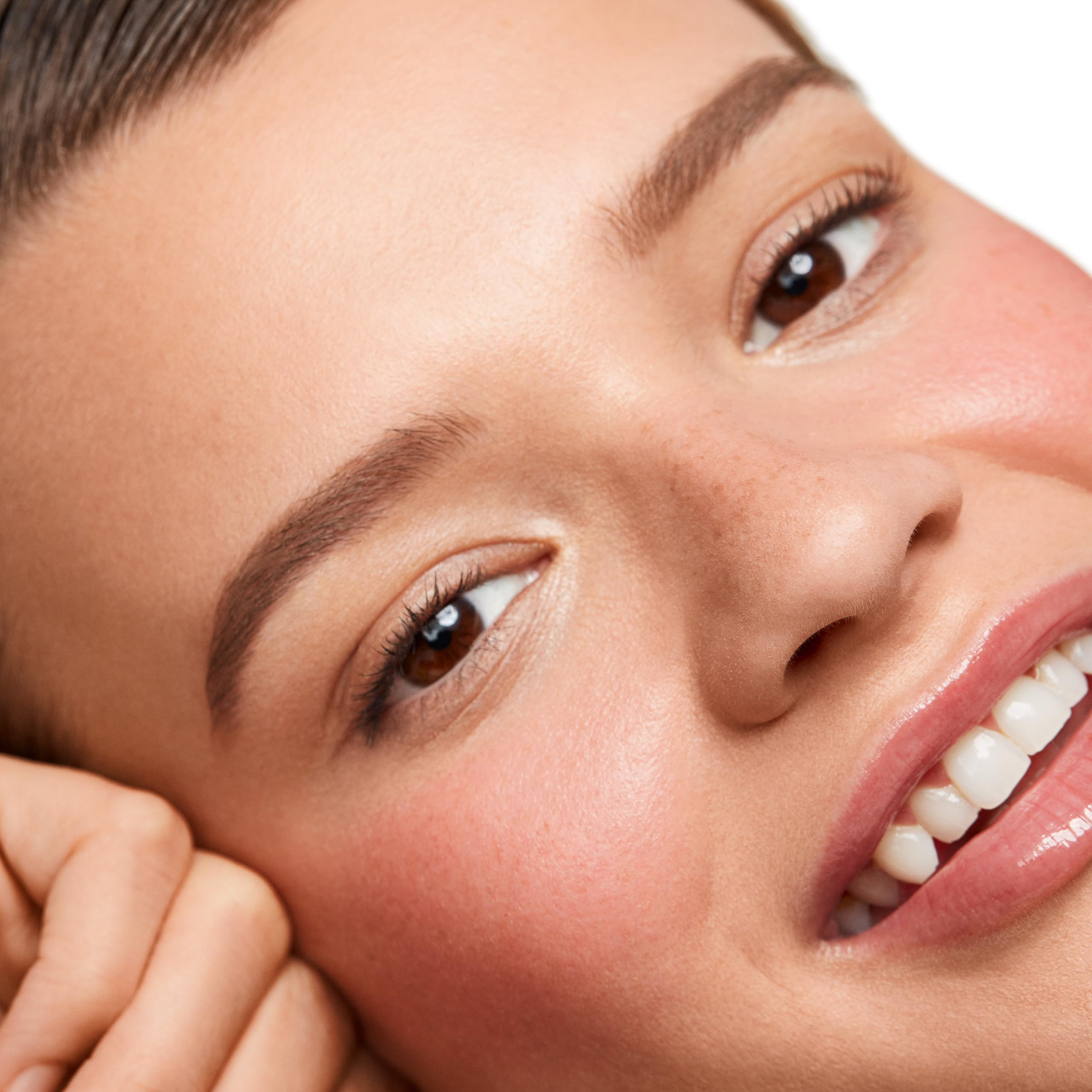 Saie Dew Liquid Blush on cheeks demonstrates a soft, lit-from-within glow.