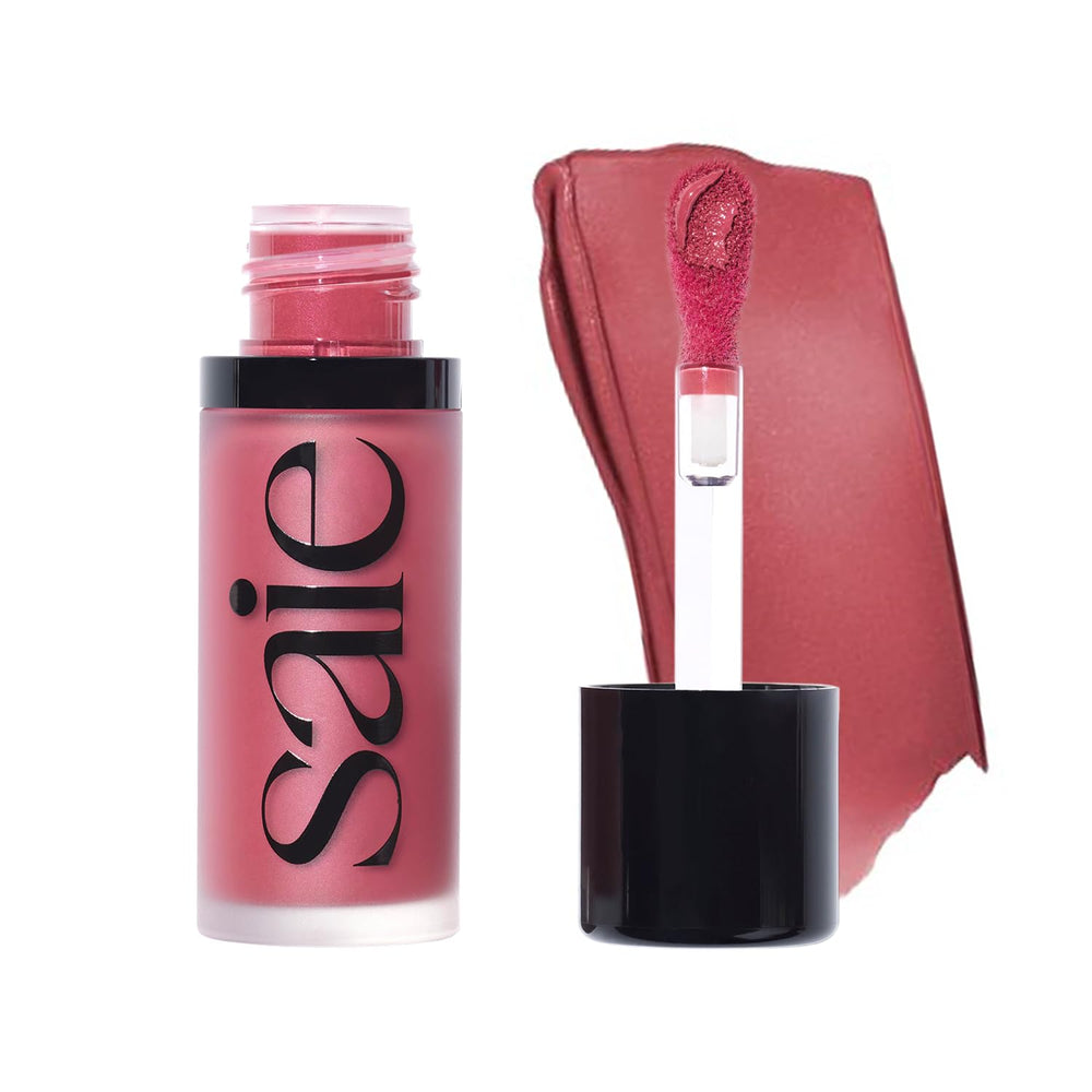 Saie Dew Liquid Blush packaging on a clean vanity, showcasing modern vegan design.