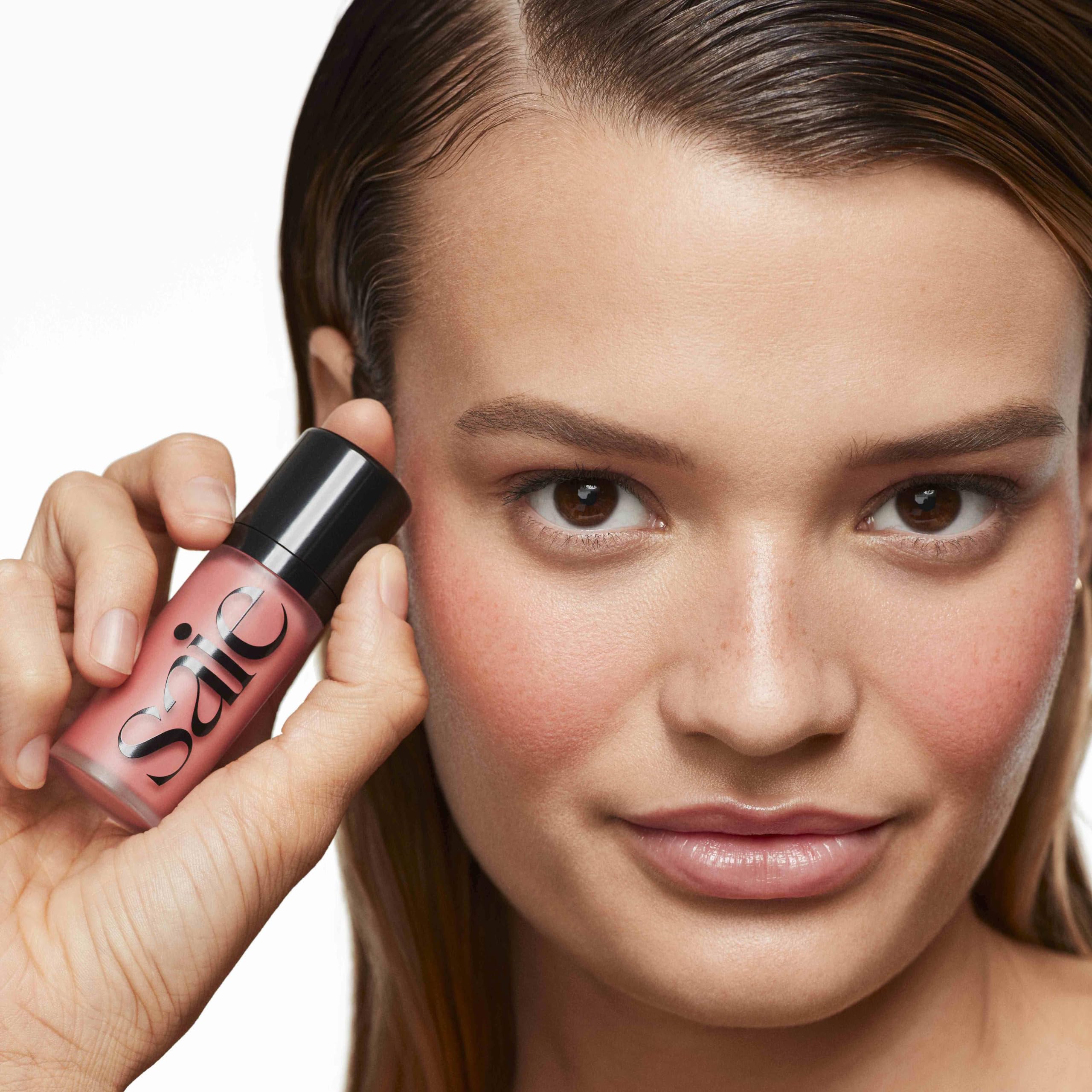 Saie Dew Liquid Blush packaging highlights vegan, cruelty-free beauty in a compact.