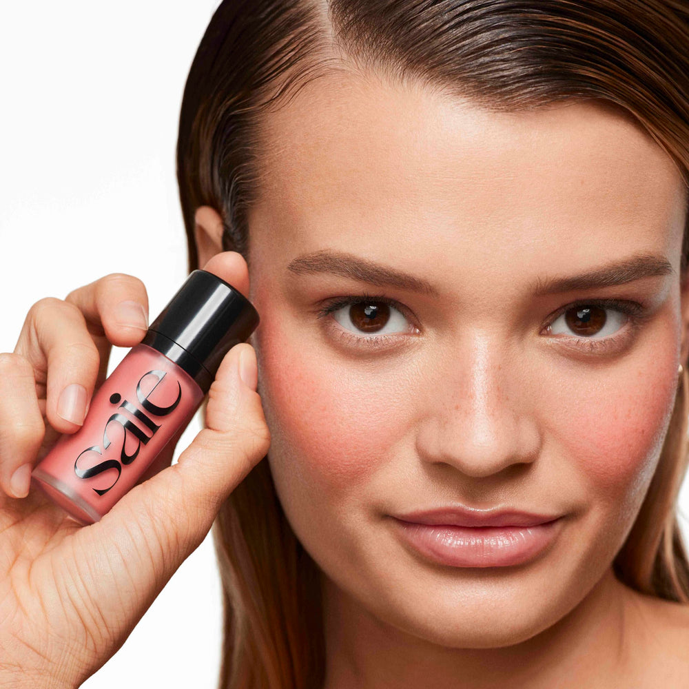 Saie Dew Liquid Blush packaging highlights vegan, cruelty-free beauty in a compact.
