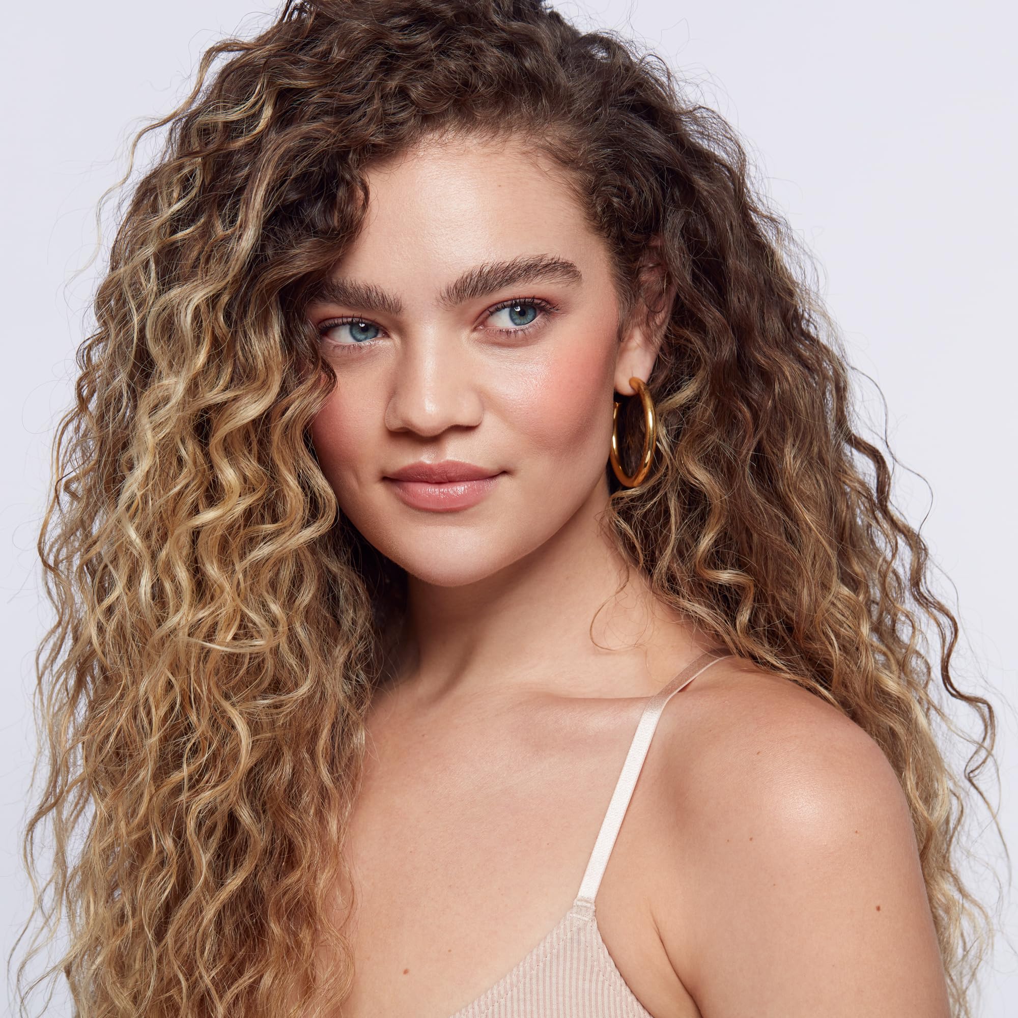 Saie Dew Liquid Blush rosy swatches showing buildable color range.