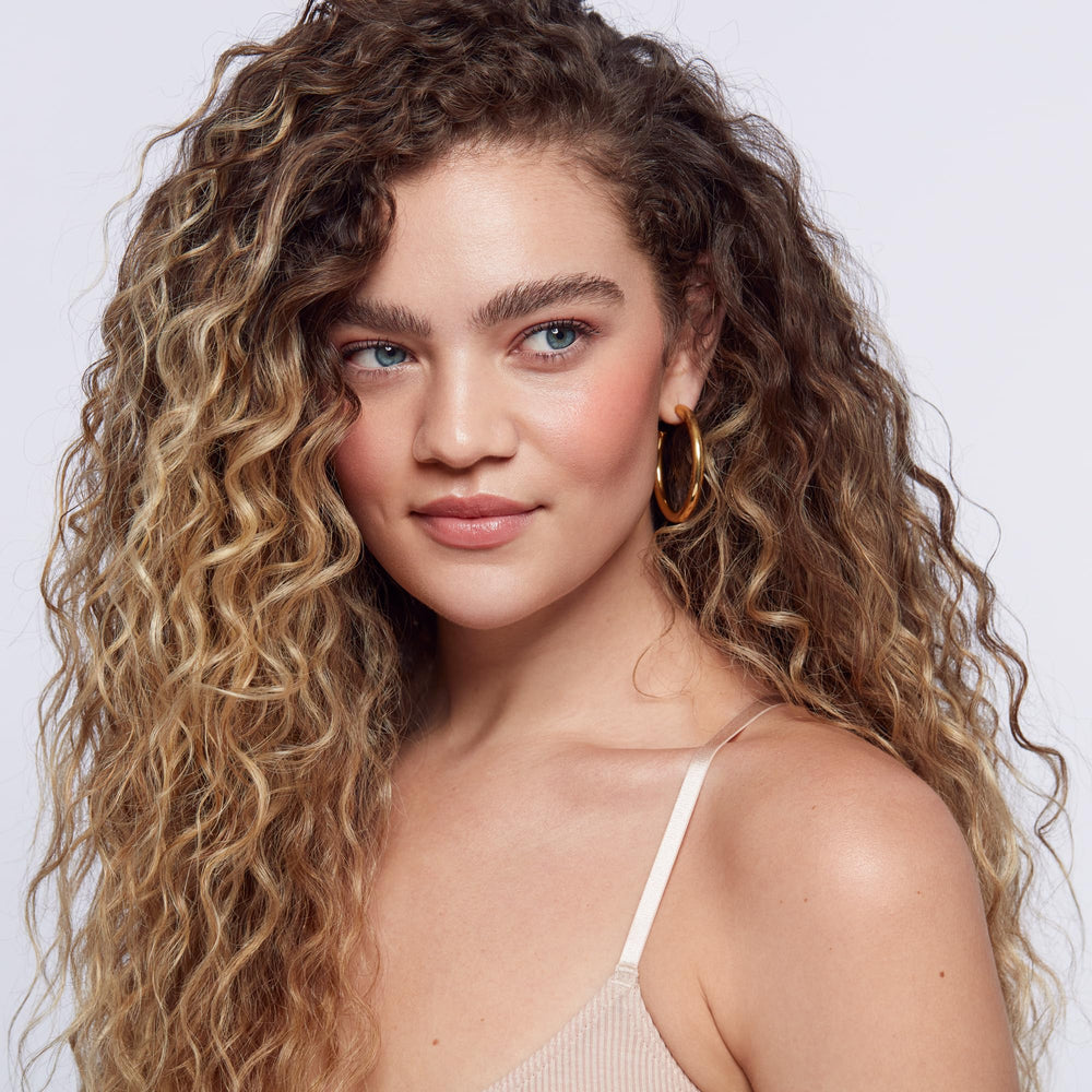 Saie Dew Liquid Blush rosy swatches showing buildable color range.