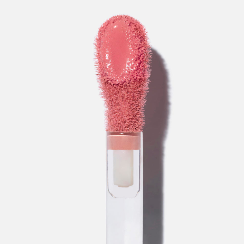 Saie Dew Liquid Blush Sweetie swatches show a sheer to medium rosy flush with dew.