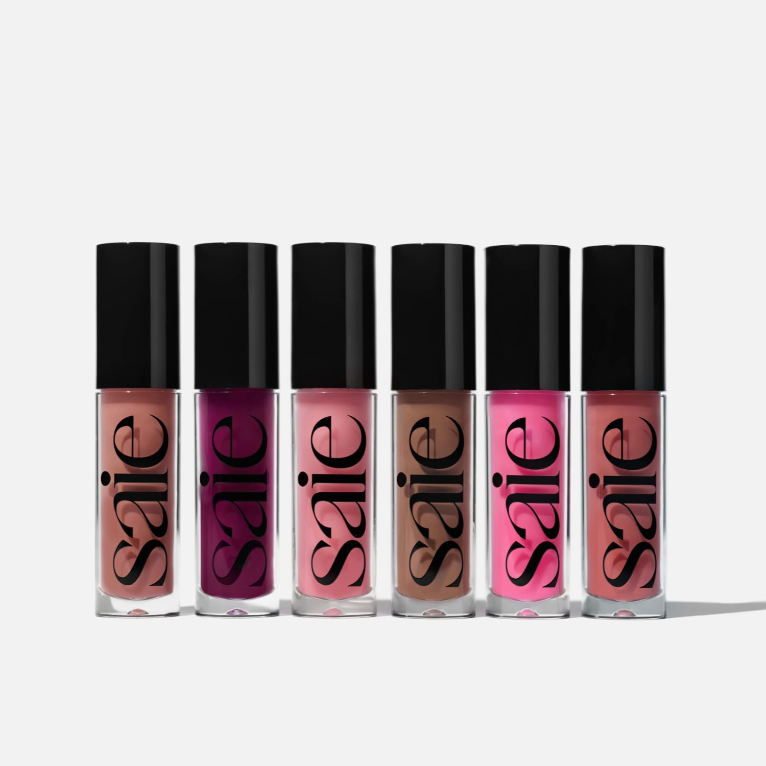 Saie Glossybounce ingredients display with jojoba and hyaluronic acid benefits