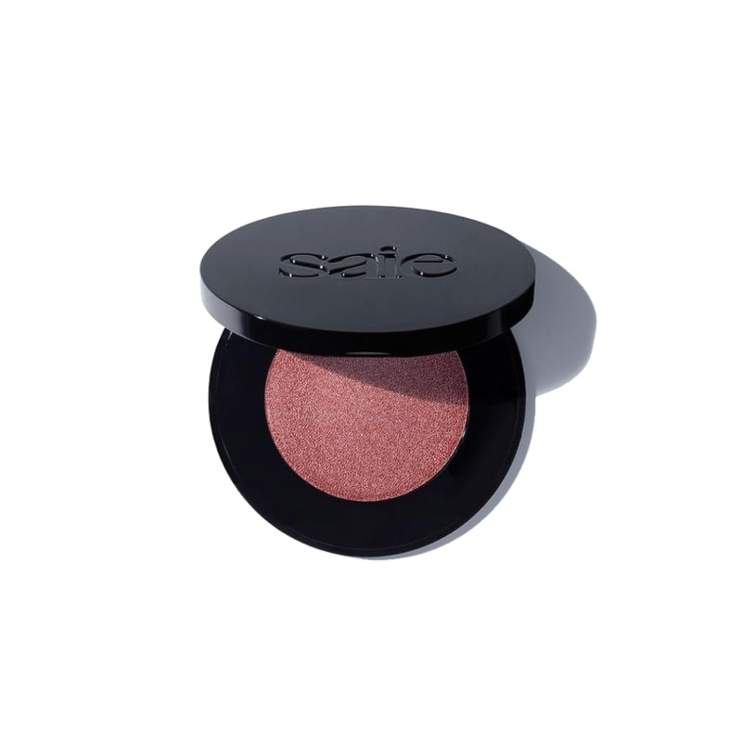 Saie compact front view showing Mauveglow shade and sleek packaging benefit portability