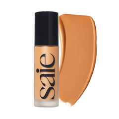 Saie Glowy Super Skin Tint front packaging showing shade 21 and glow benefits