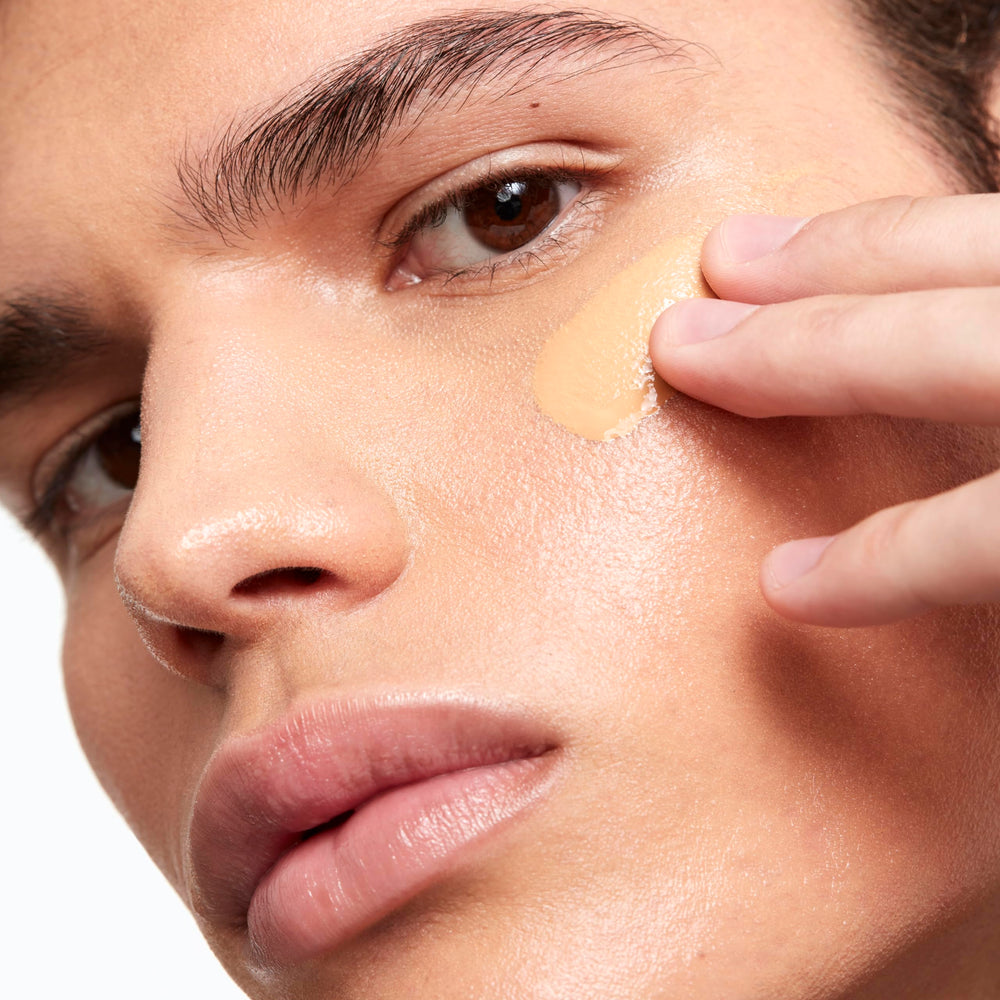 Saie creamy dewy texture swipe highlighting luminous finish
