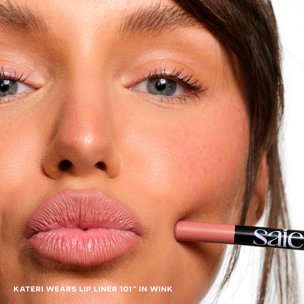 Saie Lip Liner 101 creamy swatch reveals soft matte texture for smooth lip contouring.