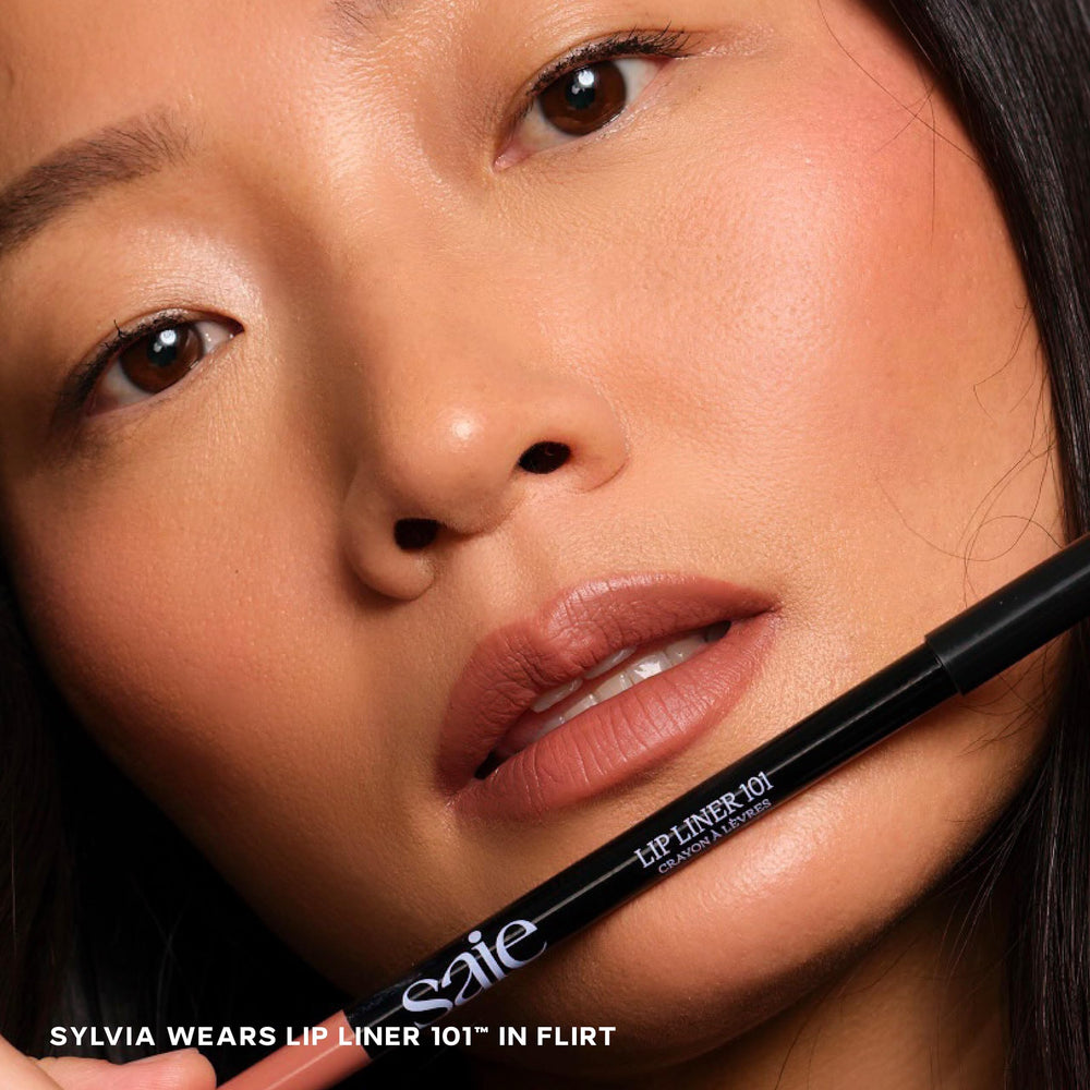 Saie Lip Liner 101 swatch in natural nude showing soft matte finish.