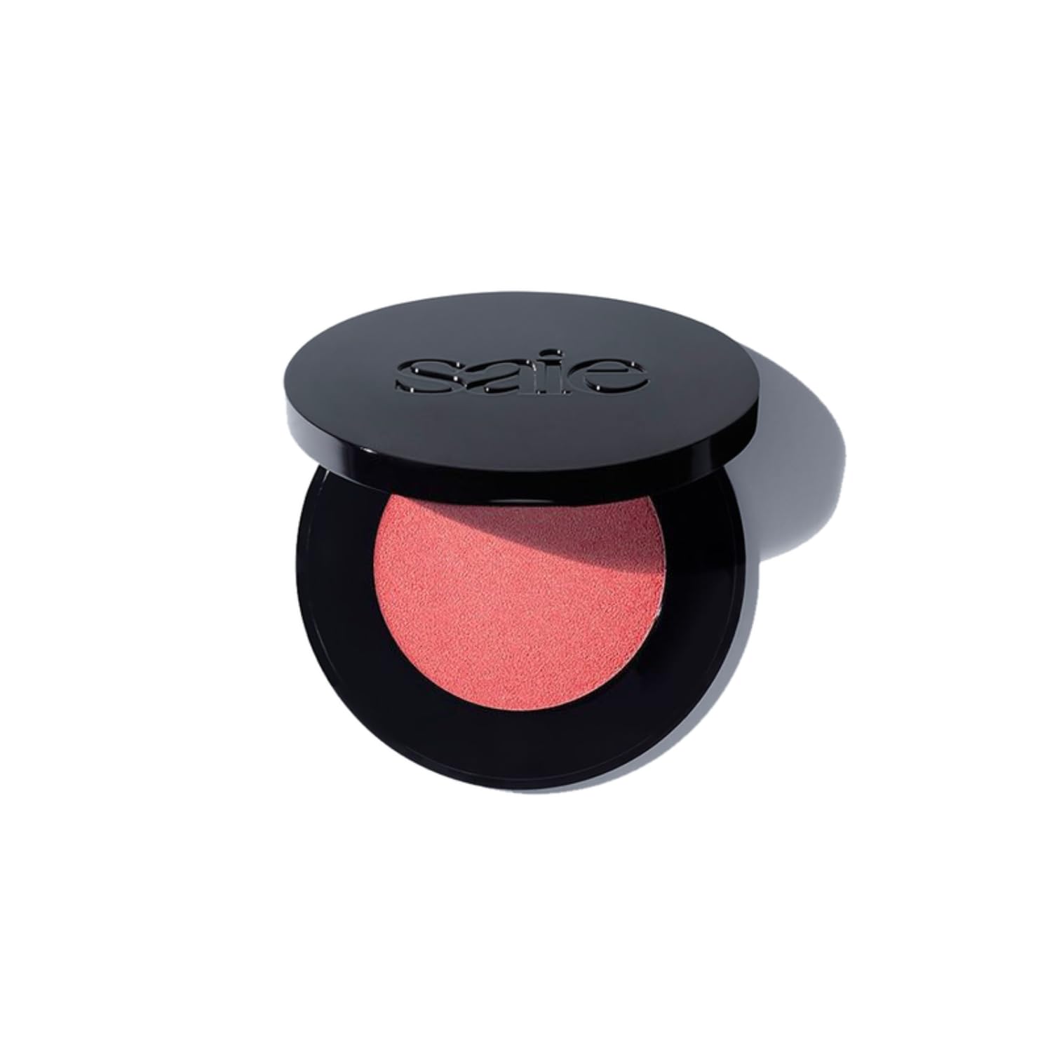 Saie Peachglow compact front view showing sleek refillable casing and warm glow