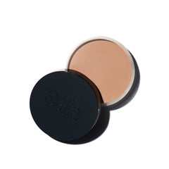 Saie Sun Melt front packaging showing product jar and shade label, highlighting portability