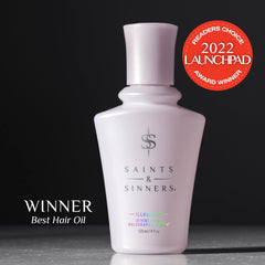 Saints & Sinners Illuminati Divine Shine iridescent glow close-up on hair fibers.