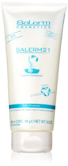 Salerm 21 B5 Silk Protein Leave-In Conditioner bottle pour for quick hydration and detangling.