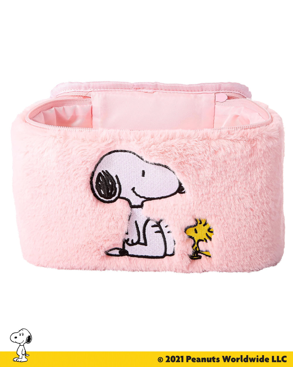 Sally Rose Peanuts Snoopy pink makeup bag on dresser combines style and storage.