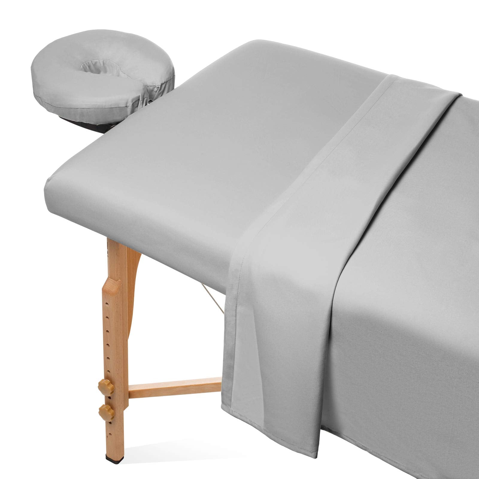 Saloniture massage table flat sheet 61x100 neatly draped for a professional look.
