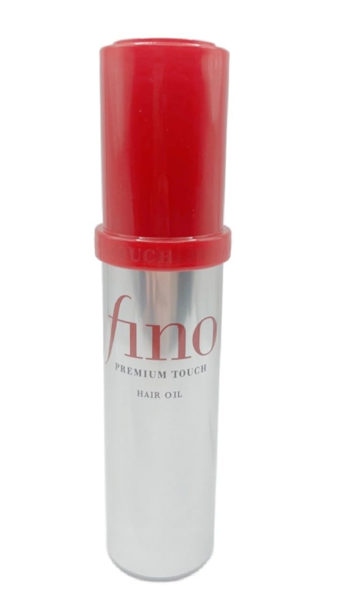 SalonTop Fino Premium Touch hair oil being applied for frizz control.