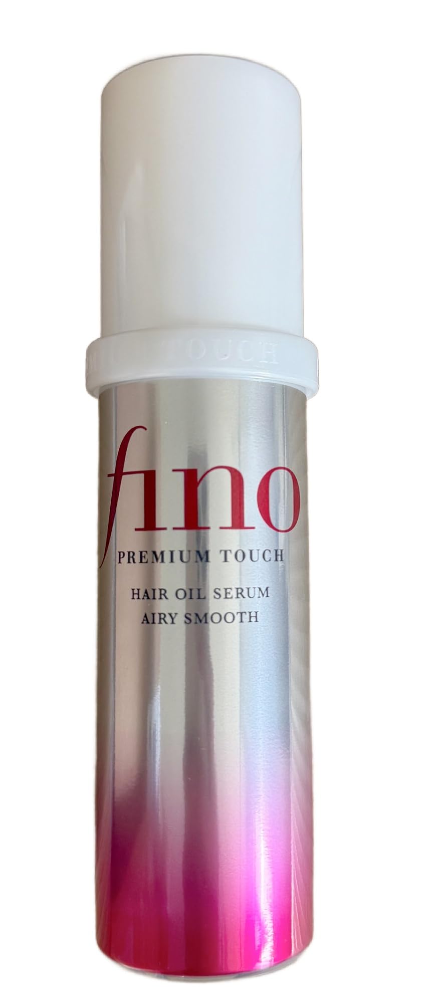 SalonTop Fino Premium Touch Hair Oil Serum airy smooth bottle pour delivers lightweight frizz control.