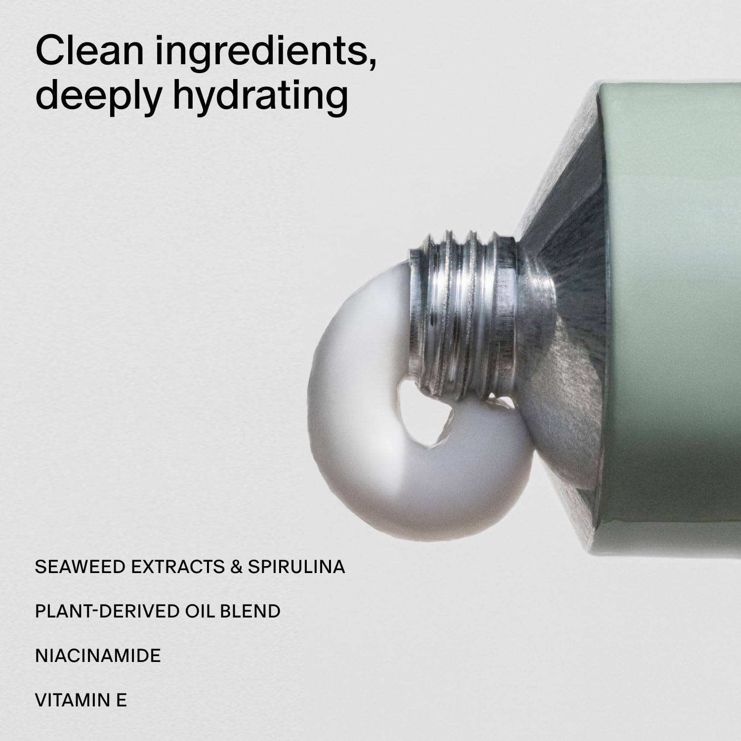 Close-up of Neroli & Basil lotion texture showing silky finish.