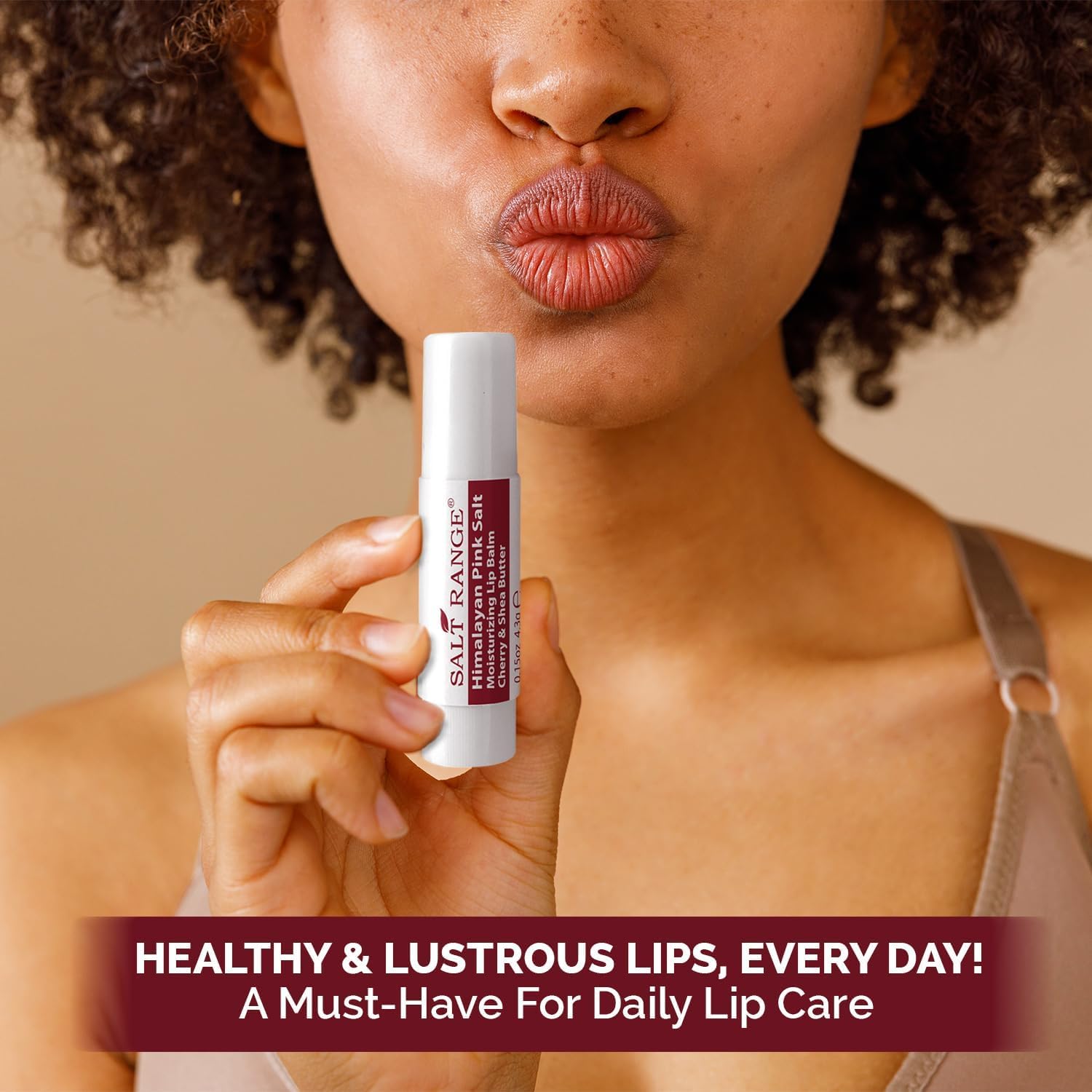 Salt Range cherry-shea lip balm application highlights quick moisturizing impact on dry lips.
