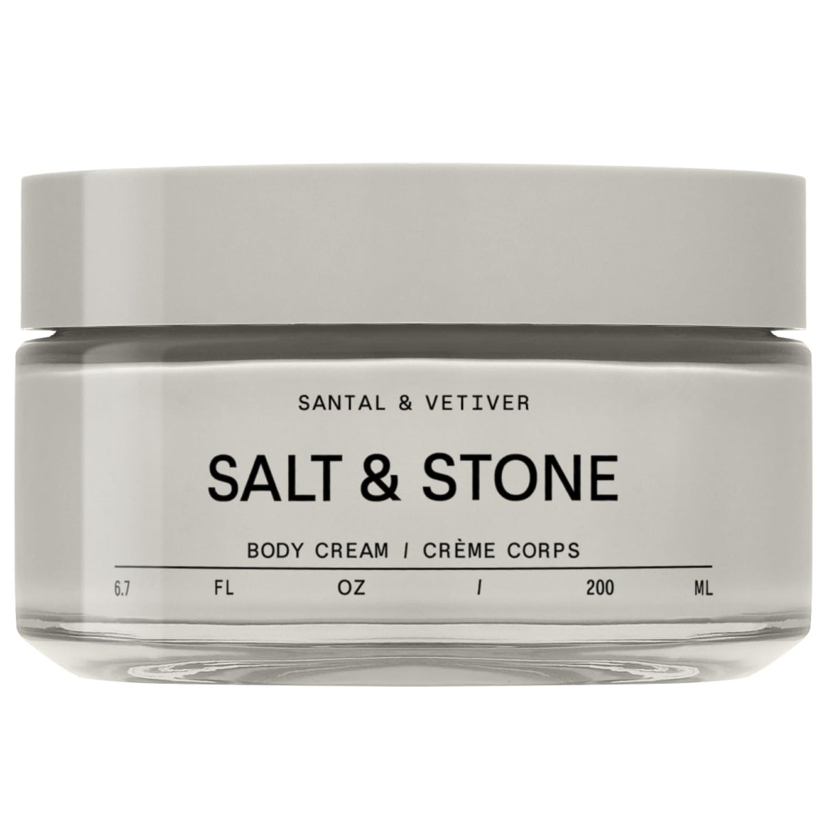 Salt & Stone Body Cream Santal & Vetiver bottle pouring rich hydration.
