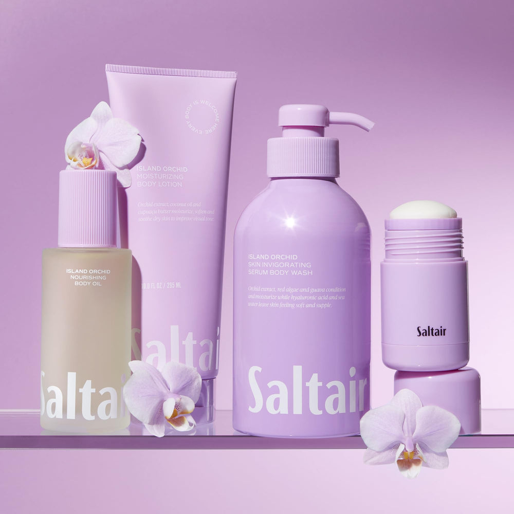 Saltair Island Orchid Lotion application on forearm conveys quick absorption without greasy residue.