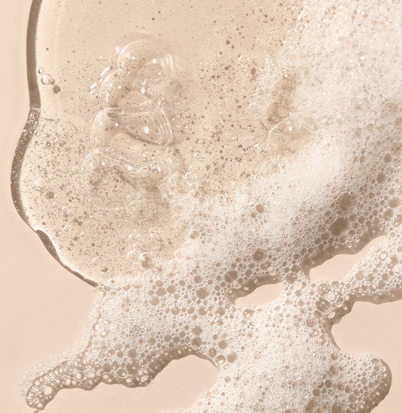 Saltair Moisture Bound shampoo lather observed on hair strands emphasizing cleansing and hydration