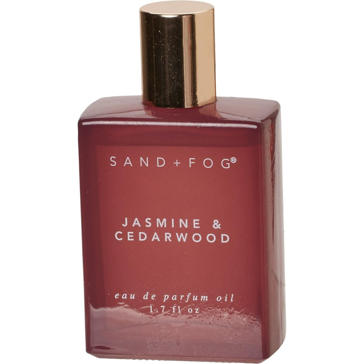 Sand and Fog Jasmine & Cedarwood perfume oil bottle—portable luxury with long-lasting scent.