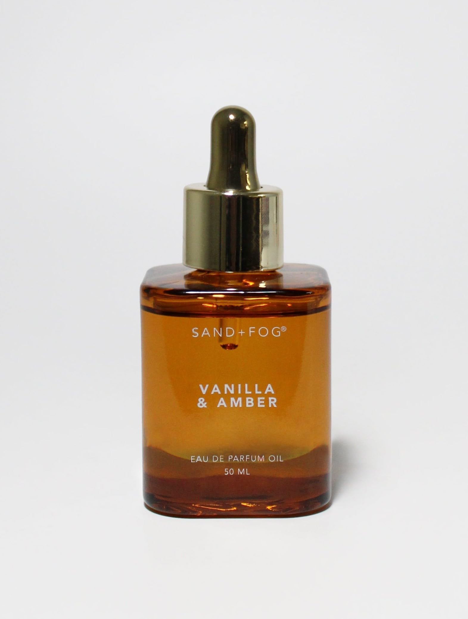 Sand + Fog vanilla & amber perfume oil dropper bottle offers long-lasting fragrance