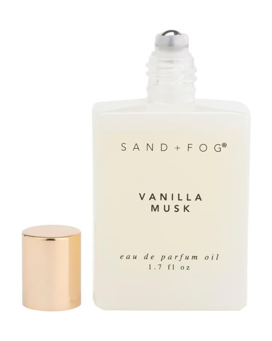 Sand + Fog Vanilla Musk perfume oil roll-on application on skin for precise, subtle scent.