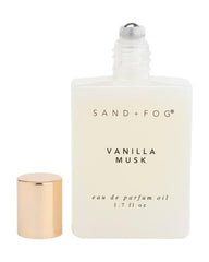 Sand + Fog Vanilla Musk perfume oil roll-on application on skin for precise, subtle scent.