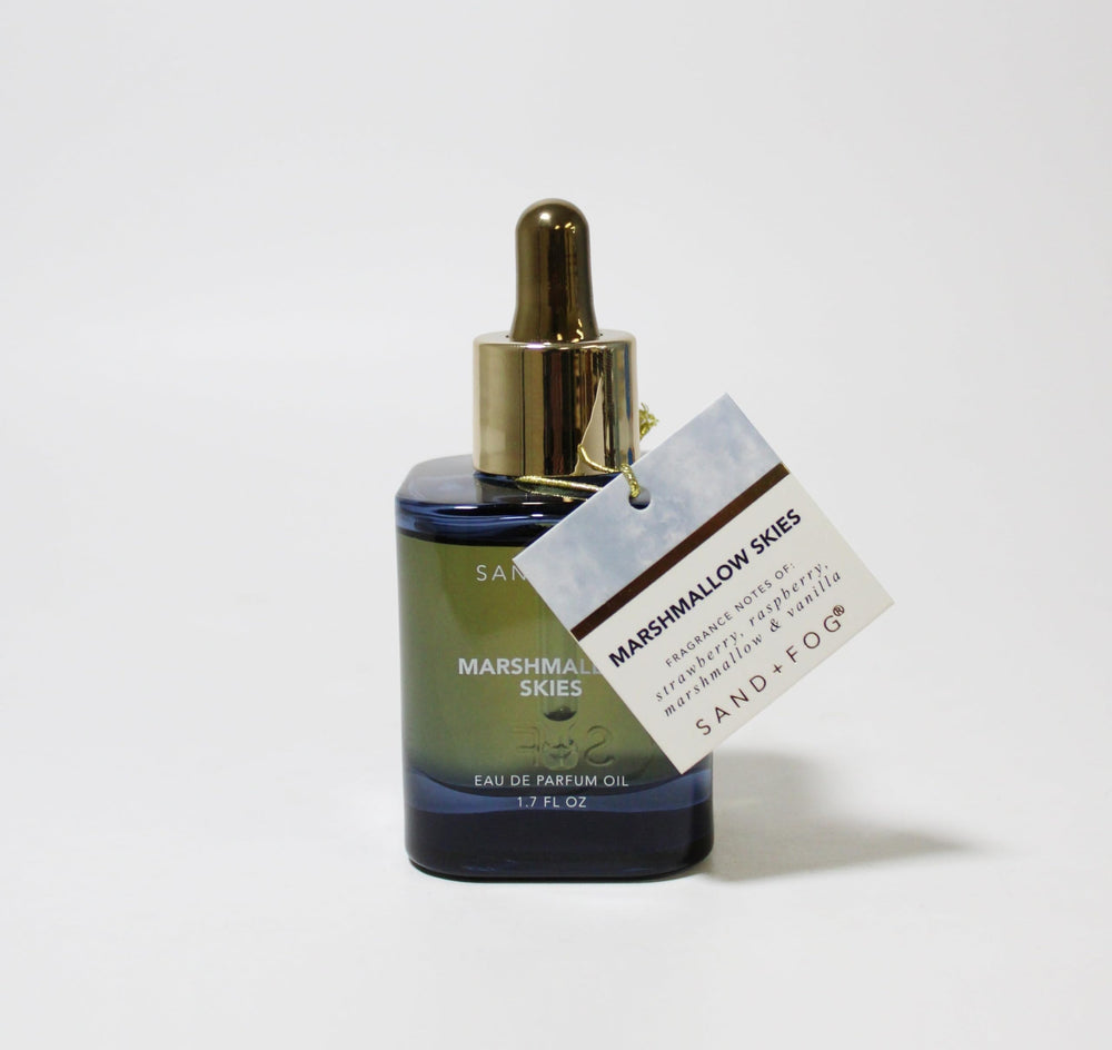 Sand + Fog Marshmallow Skies dark-glass bottle protects fragrance from light.