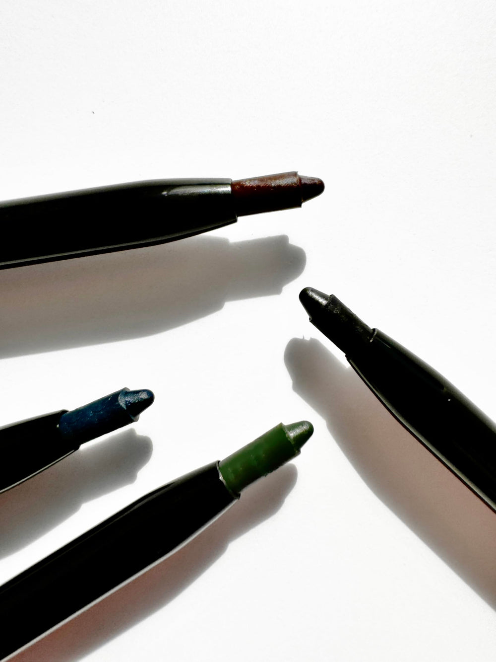 Sandstone Scandinavia cruelty-free eyeliner green branding communicates ethical makeup choices