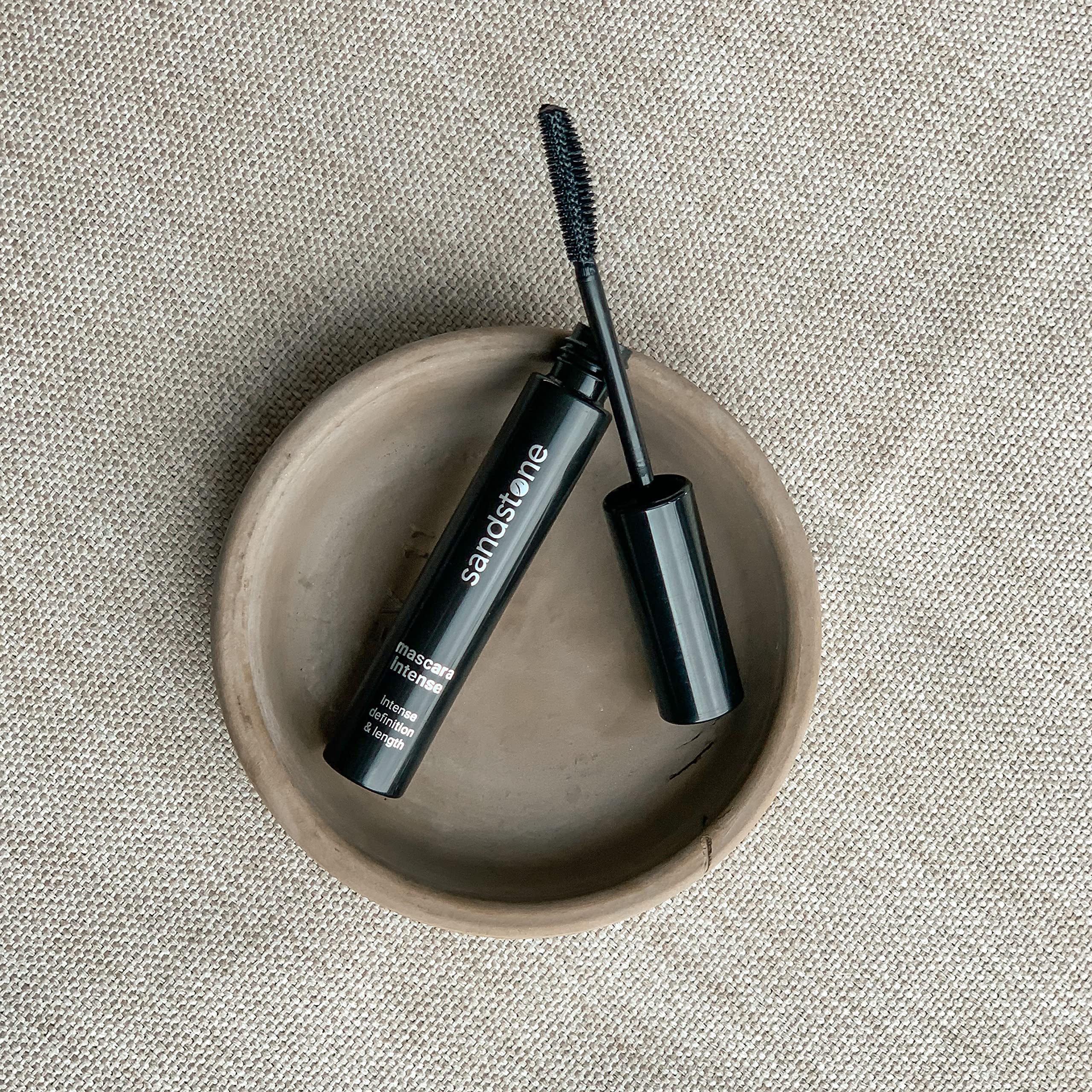 Sandstone Scandinavia cruelty-free logo signaling non toxic makeup choice.