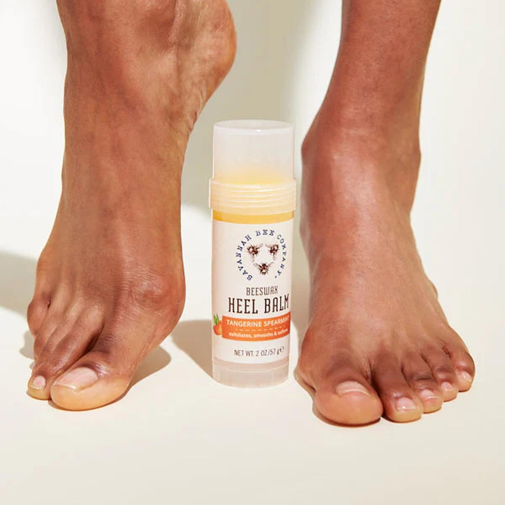 Savannah Bee Company Beeswax Heel Balm texture swatch showing moisturizing feel.