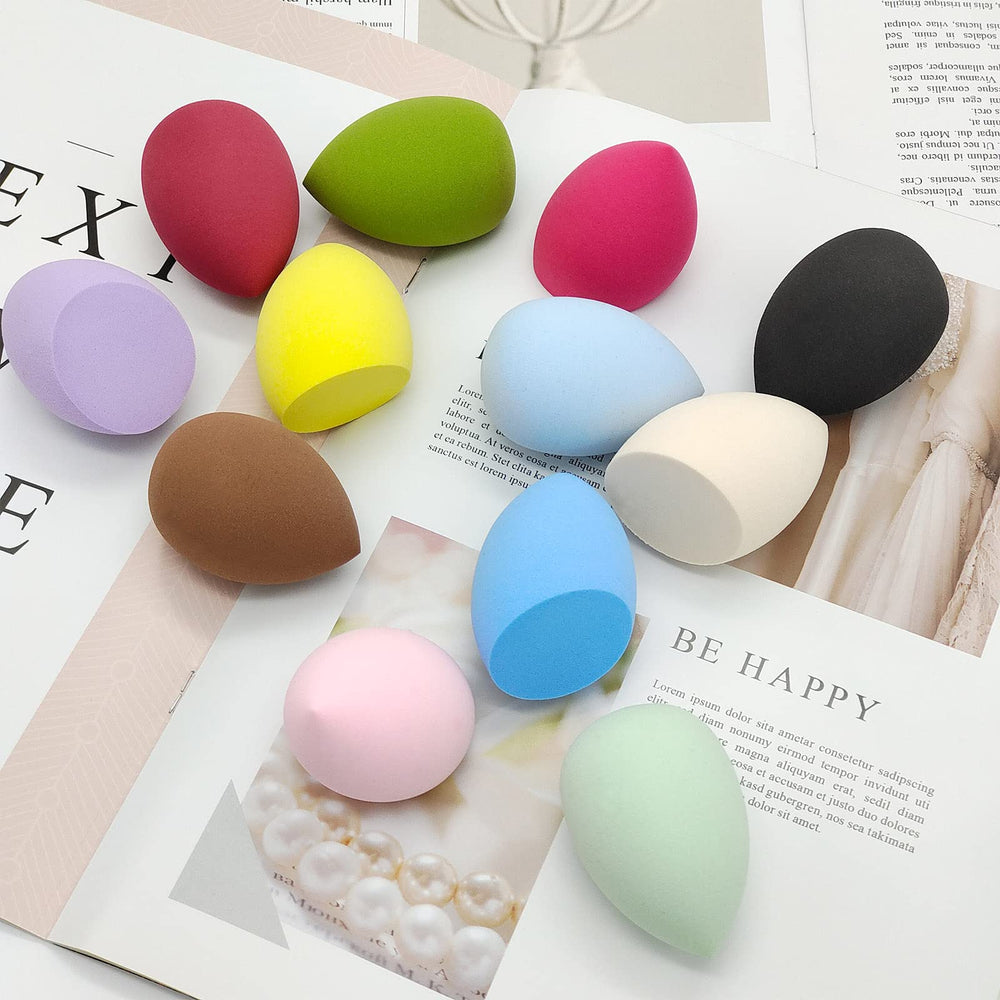 Scartink multicolor sponges styled on a vanity to suggest travel-ready, salon storage