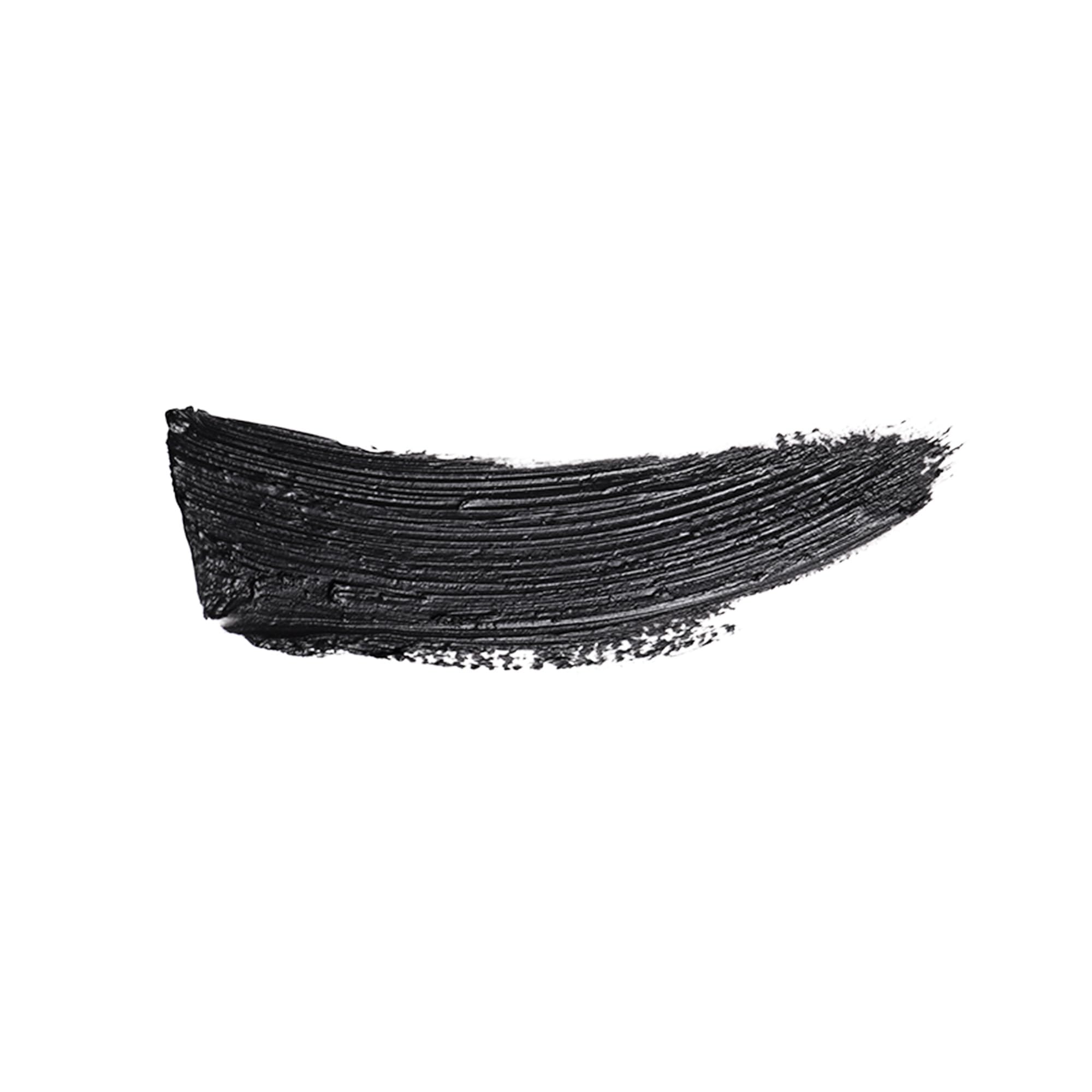 SCENT BEAUTY Dolly-Eyes Mascara brush close-up emphasizing root-to-tip lift.