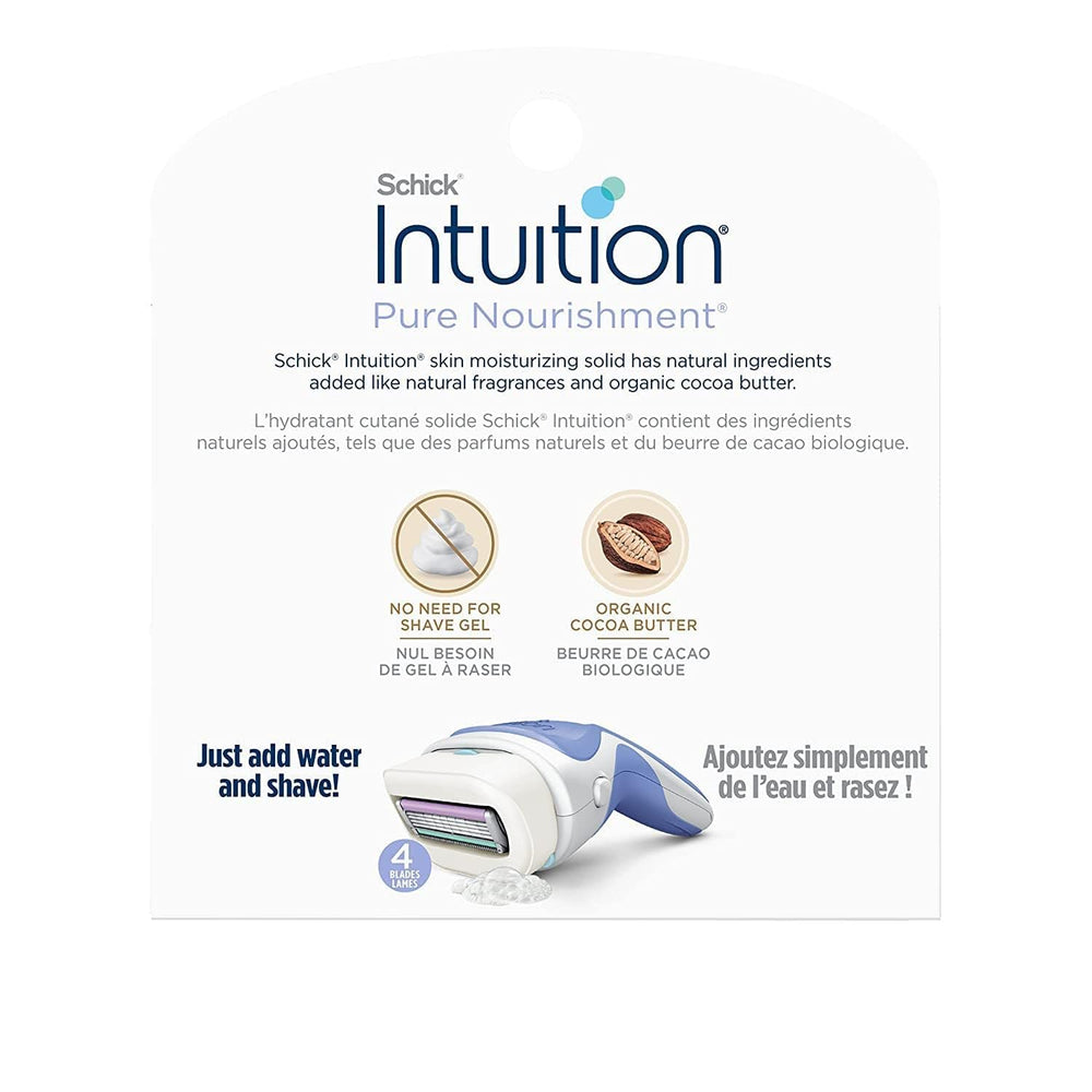 Schick Intuition 4-blade pivoting head close-up for contour-friendly glide.