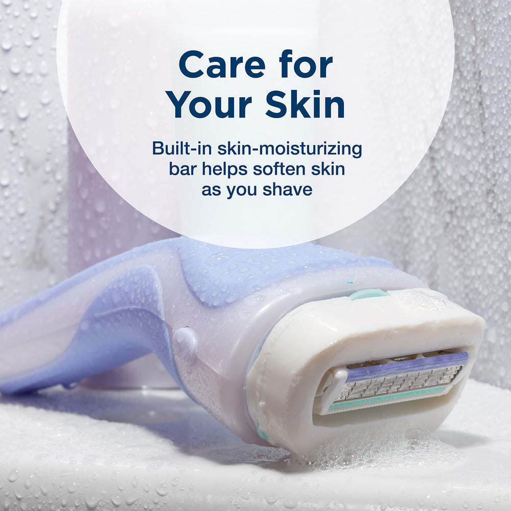 Schick Intuition four-blade refill with pivoting head, contour-hugging shave.